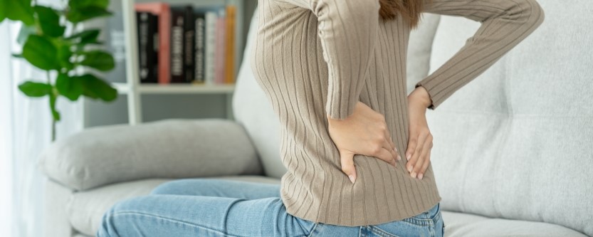 Patient consulting a pain management doctor in Tampa for chronic lower back pain treatment
